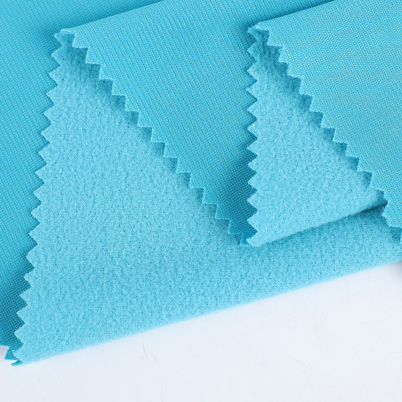 170g磨毛抓毛单面金光绒布 涤纶运动服布料 柔软金光绒校服面料详情图2