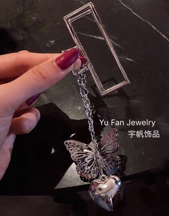 爆款网红合金镂空发顶合金大爪，吊坠蝴蝶结卷发筒固定发顶详情图1