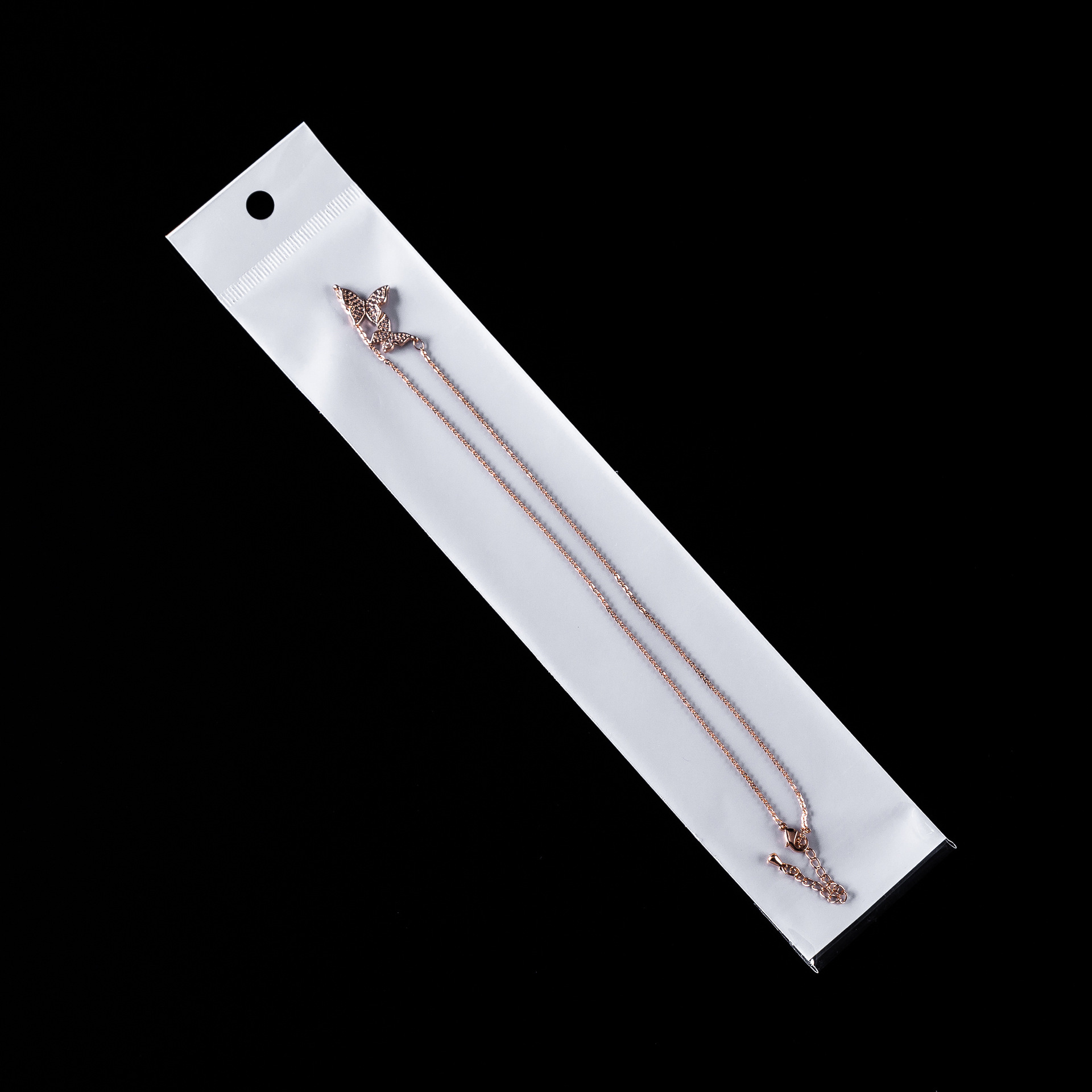 工厂现货opp袋不干胶白色珠光膜卡头袋 钛钢项链手链袋饰品包装袋 详情图2