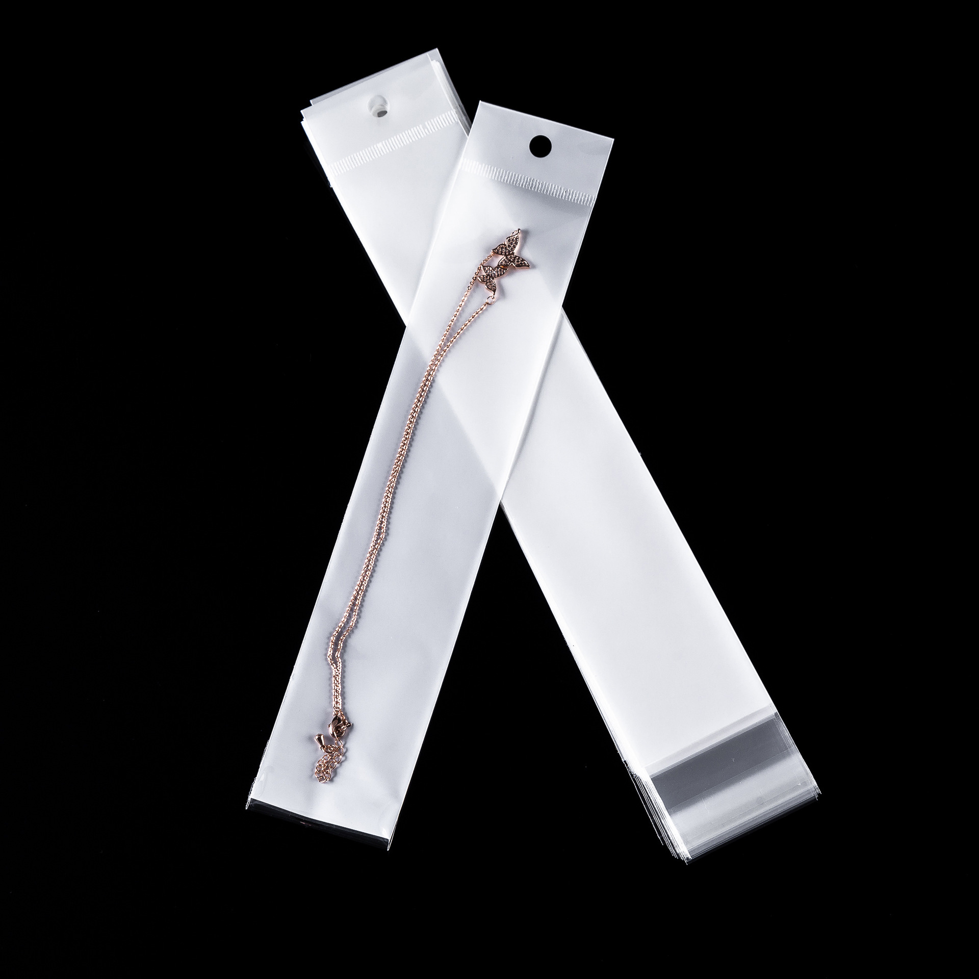 工厂现货opp袋不干胶白色珠光膜卡头袋 钛钢项链手链袋饰品包装袋 详情图3